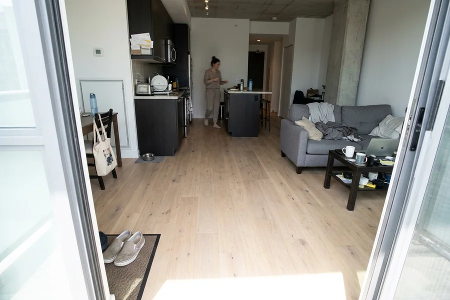 After hardwood refinishing Toronto: condo engineered oak, open plan in King West