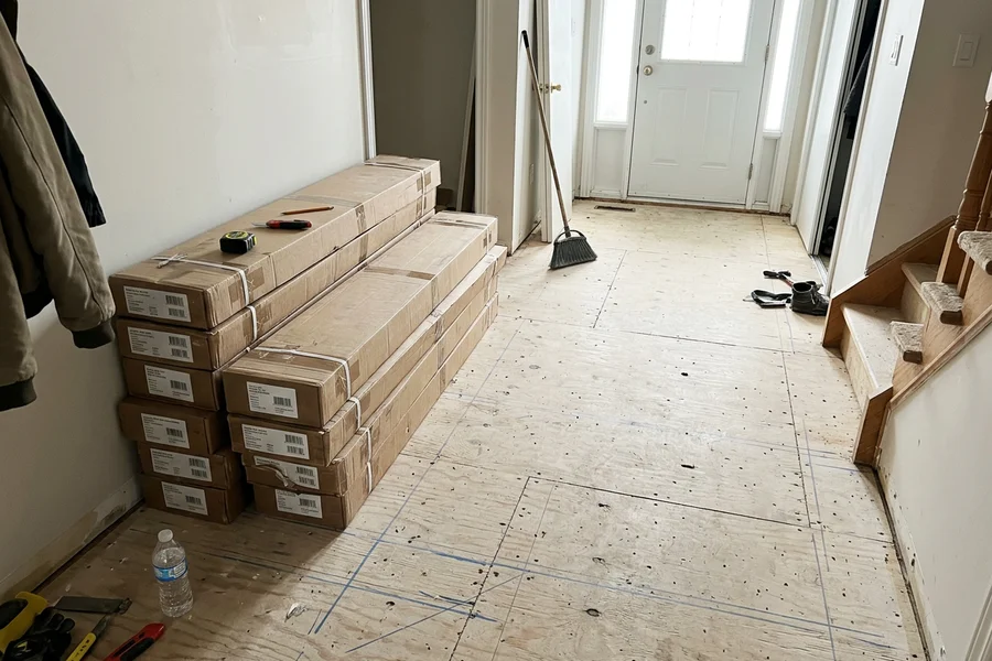 Before hardwood refinishing Toronto: white oak herringbone entry in Erin Mills
