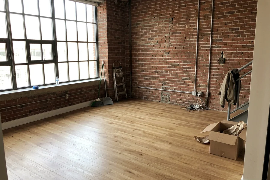 Refinished engineered oak in an empty Liberty Village loft condo