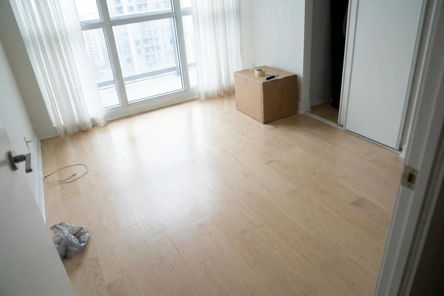 Pale maple floor after a dustless refinish in a Yorkville condo